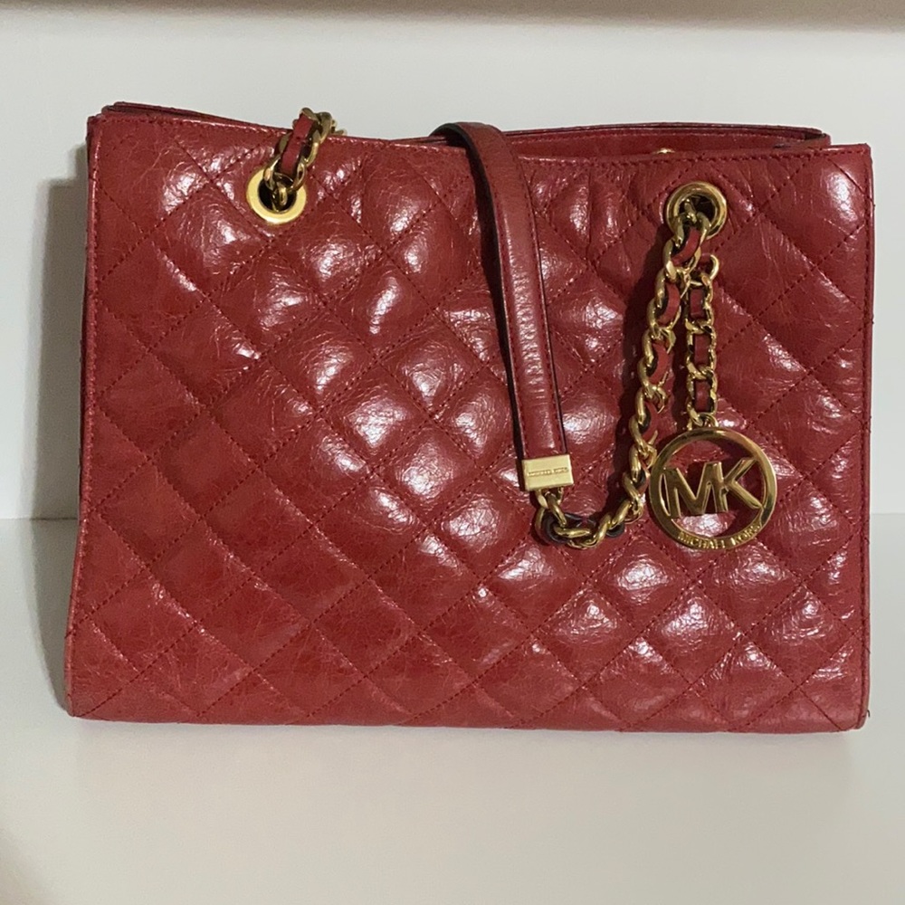 MK red leather shoulder bag